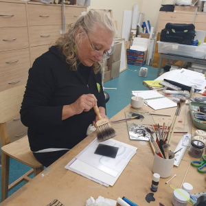Alison at a glass painting workshop